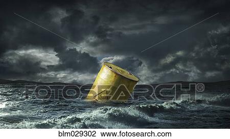 Oil barrel floating in stormy sea View Large Photo Image Stock Image - Oil barrel floating in stormy sea. Fotosearch