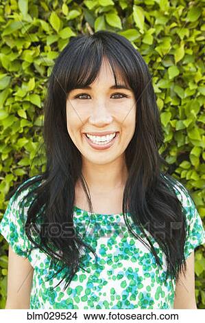 Woman smiling outdoors View Large Photo Image Picture - Woman smiling outdoors. Fotosearch