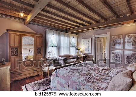 Armoire and bed in bedroom View Large Photo Image Stock Photography - Armoire and bed in bedroom. Fotosearch