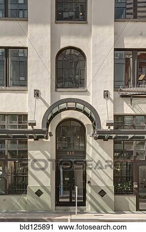 Stock Image - Awning over front door of urban building. Fotosearch