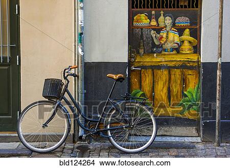 Picture - Bicycle parked on city street. Fotosearch