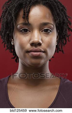 Black woman's serious face View Large Photo Image Stock Photo - Black woman's serious face. Fotosearch