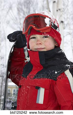 Caucasian boy wearing ski gear in snow View Large Photo Image Stock Image - Caucasian boy wearing ski gear in snow. Fotosearch