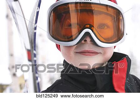 Caucasian boy wearing ski gear in snow View Large Photo Image Stock Photo - Caucasian boy wearing ski gear in snow. Fotosearch