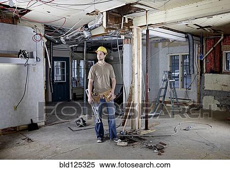 Caucasian construction worker in hard hat on site View Large Photo Image Stock Photography - Caucasian construction worker in hard hat on site. Fotosearch