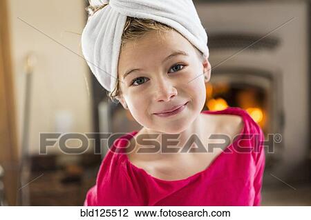 Caucasian girl smiling with towel wrapped on head View Large Photo Image Stock Image - Caucasian girl smiling with towel wrapped on head. Fotosearch