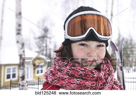 Caucasian girl wearing ski gear in snow View Large Photo Image Stock Photo - Caucasian girl wearing ski gear in snow. Fotosearch