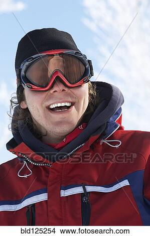 Caucasian man wearing ski goggles View Large Photo Image Picture - Caucasian man wearing ski goggles. Fotosearch