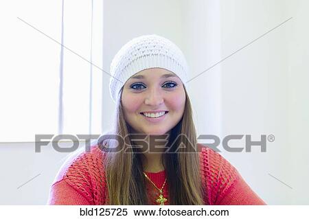 Stock Photography - Caucasian student smiling in class. Fotosearch