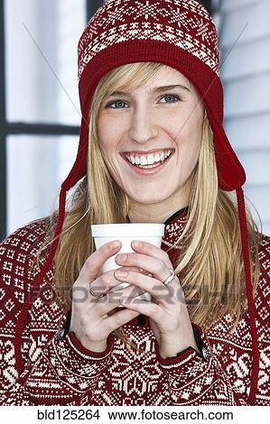 Caucasian woman in winter hat with cup of coffee View Large Photo Image Picture - Caucasian woman in winter hat with cup of coffee. Fotosearch