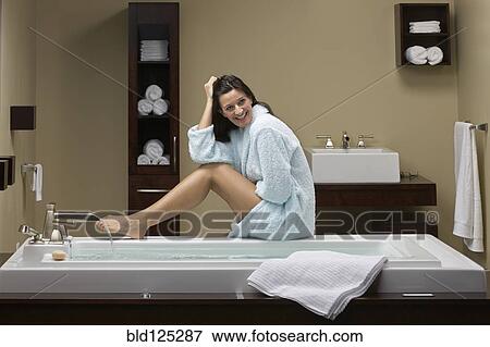 Caucasian woman relaxing in bathroom View Large Photo Image Stock Photo - Caucasian woman relaxing in bathroom. Fotosearch