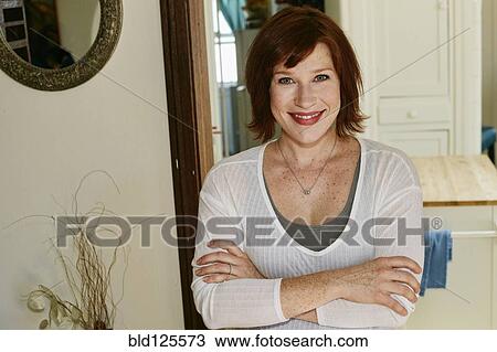 Stock Image - Caucasian woman smiling. Fotosearch