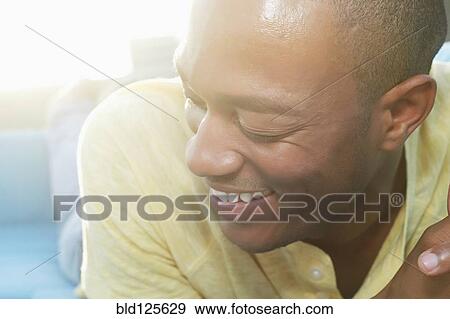 Close up of Black man smiling View Large Photo Image Stock Photo - Close up of Black man smiling. Fotosearch