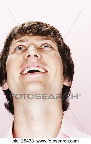 Close up of Caucasian man smiling View Large Photo Image Stock Image - Close up of Caucasian man smiling. Fotosearch