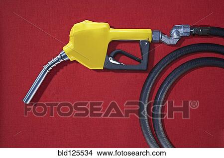 Picture - Close up of gasoline pump nozzle. Fotosearch