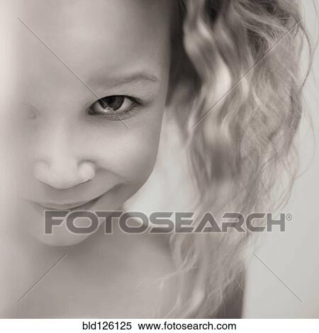 Stock Photography - Close up of girl's smiling face. Fotosearch