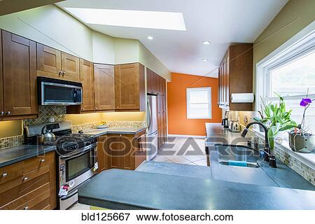 Counters and cabinets in domestic kitchen View Large Photo Image Stock Photo - Counters and cabinets in domestic kitchen. Fotosearch