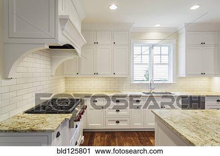 Counters and cabinets in luxury kitchen View Large Photo Image Stock Image - Counters and cabinets in luxury kitchen. Fotosearch