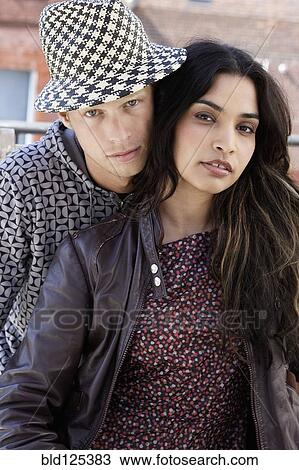 Couple hugging outdoors View Large Photo Image Stock Image - Couple hugging outdoors. Fotosearch