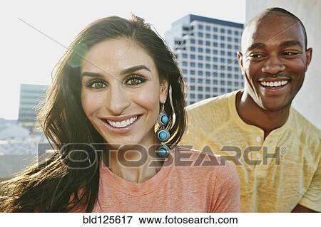Stock Photo - Couple smiling together. Fotosearch