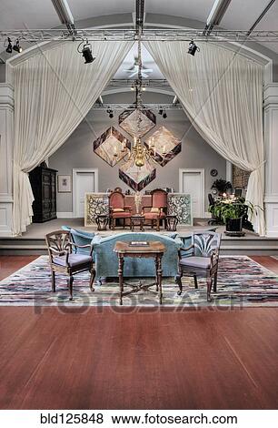 Stock Photo - Curtains over dining room in custom home. Fotosearch