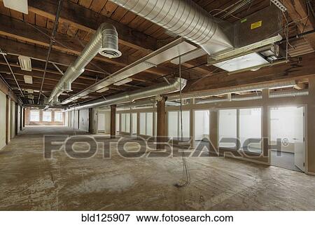 Empty office space under construction View Large Photo Image Stock Photo - Empty office space under construction. Fotosearch