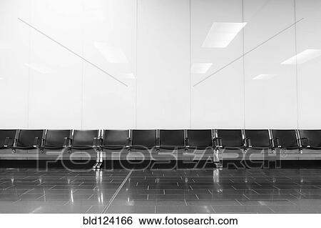 Empty seats in airport lobby View Large Photo Image Stock Photograph - Empty seats in airport lobby. Fotosearch