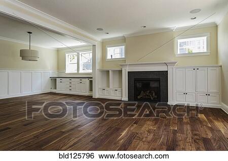 Stock Photograph - Fireplace and built-in shelves in living room. Fotosearch