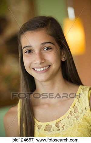 Hispanic teenage girl smiling View Large Photo Image Stock Photo - Hispanic teenage girl smiling. Fotosearch