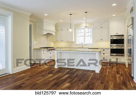 Island and counters in luxury kitchen View Large Photo Image Stock Photo - Island and counters in luxury kitchen. Fotosearch