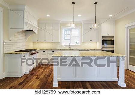 Island and counters in luxury kitchen View Large Photo Image Stock Photo - Island and counters in luxury kitchen. Fotosearch