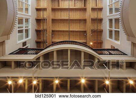 Stock Image - Low angle view of balcony in office building. Fotosearch