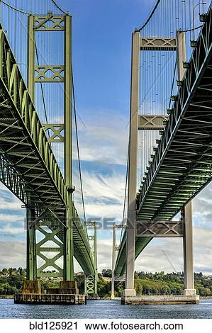 Stock Image - Low angle view of Narrows Bridge, Tacoma, Washington, United States. Fotosearch