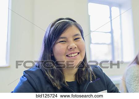Native American student smiling in class View Large Photo Image Picture - Native American student smiling in class. Fotosearch