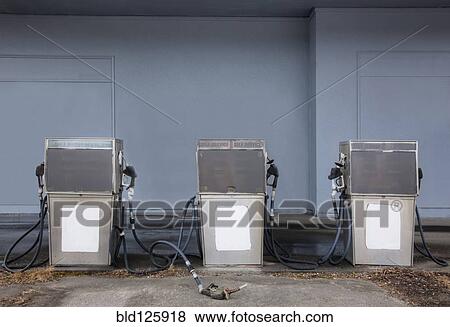Stock Photo - Pumps at abandoned gas station. Fotosearch