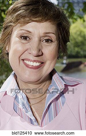 Stock Image - Senior Caucasian woman smiling outdoors. Fotosearch