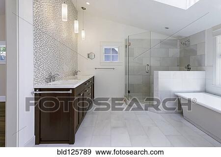 Stock Photo - Sinks, bathtub and shower in modern bathroom. Fotosearch