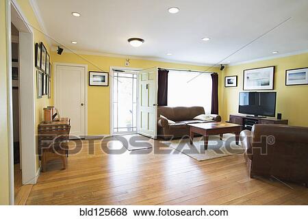 Stock Photo - Sofas and coffee table in living room. Fotosearch