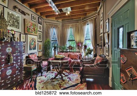 Stock Image - Sofas and drawers in living room. Fotosearch