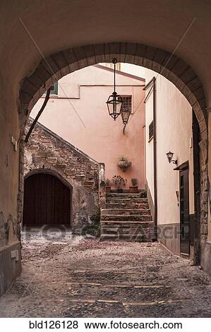 Stone archway to courtyard and steps View Large Photo Image Stock Photo - Stone archway to courtyard and steps. Fotosearch