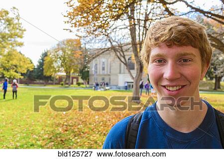 Stock Photo - Student smiling on campus. Fotosearch