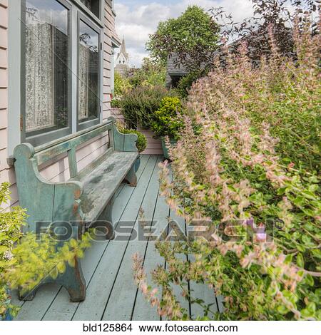 Wooden bench on porch View Large Photo Image Picture - Wooden bench on porch. Fotosearch