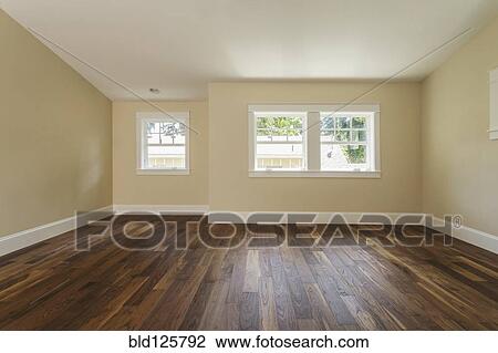 Stock Image - Wooden floor in empty bedroom. Fotosearch