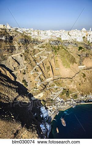 Aerial view of hilltop town and bay, Thira, Egeo, Greece View Large Photo Image Picture - Aerial view of hilltop town and bay, Thira, Egeo, Greece. Fotosearch