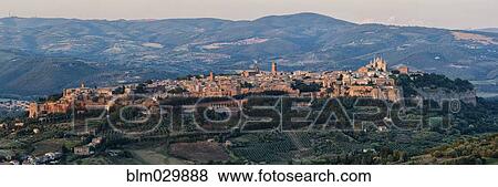Aerial view of hilltop town at dusk, Orvieto, Umbria, Italy View Large Photo Image Stock Photo - Aerial view of hilltop town at dusk, Orvieto, Umbria, Italy. Fotosearch