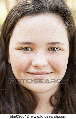 Stock Image - Caucasian girl smiling. Fotosearch