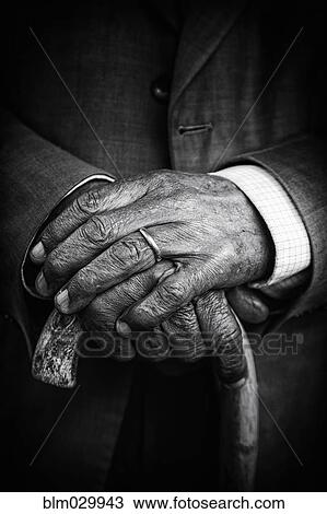 Close up of senior man's hands on cane View Large Photo Image Stock Image - Close up of senior man's hands on cane. Fotosearch