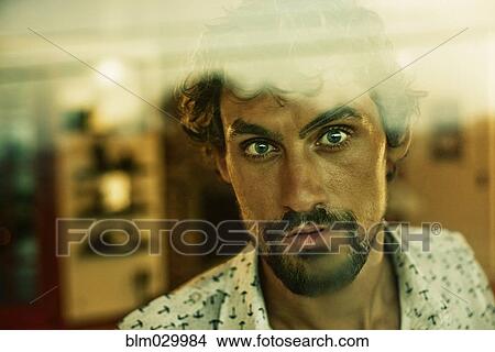 Picture - Close up portrait of serious man with beard. Fotosearch