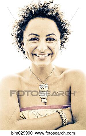Close up portrait of smiling woman wearing owl necklace View Large Photo Image Stock Image - Close up portrait of smiling woman wearing owl necklace. Fotosearch