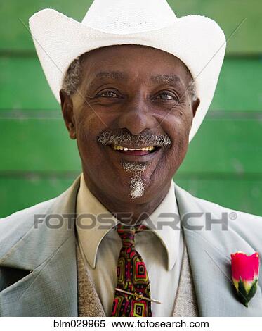 Stock Photography - Close up portrait of well-dressed Black man. Fotosearch